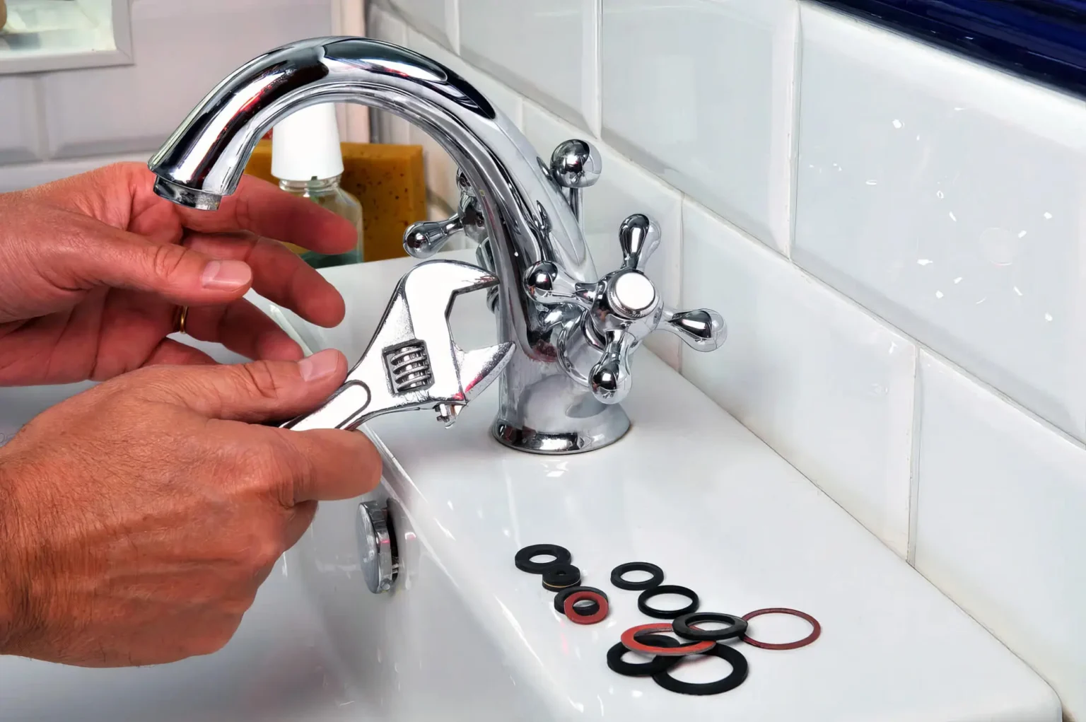 Plumber maintaining a bathroom faucet in Fremont